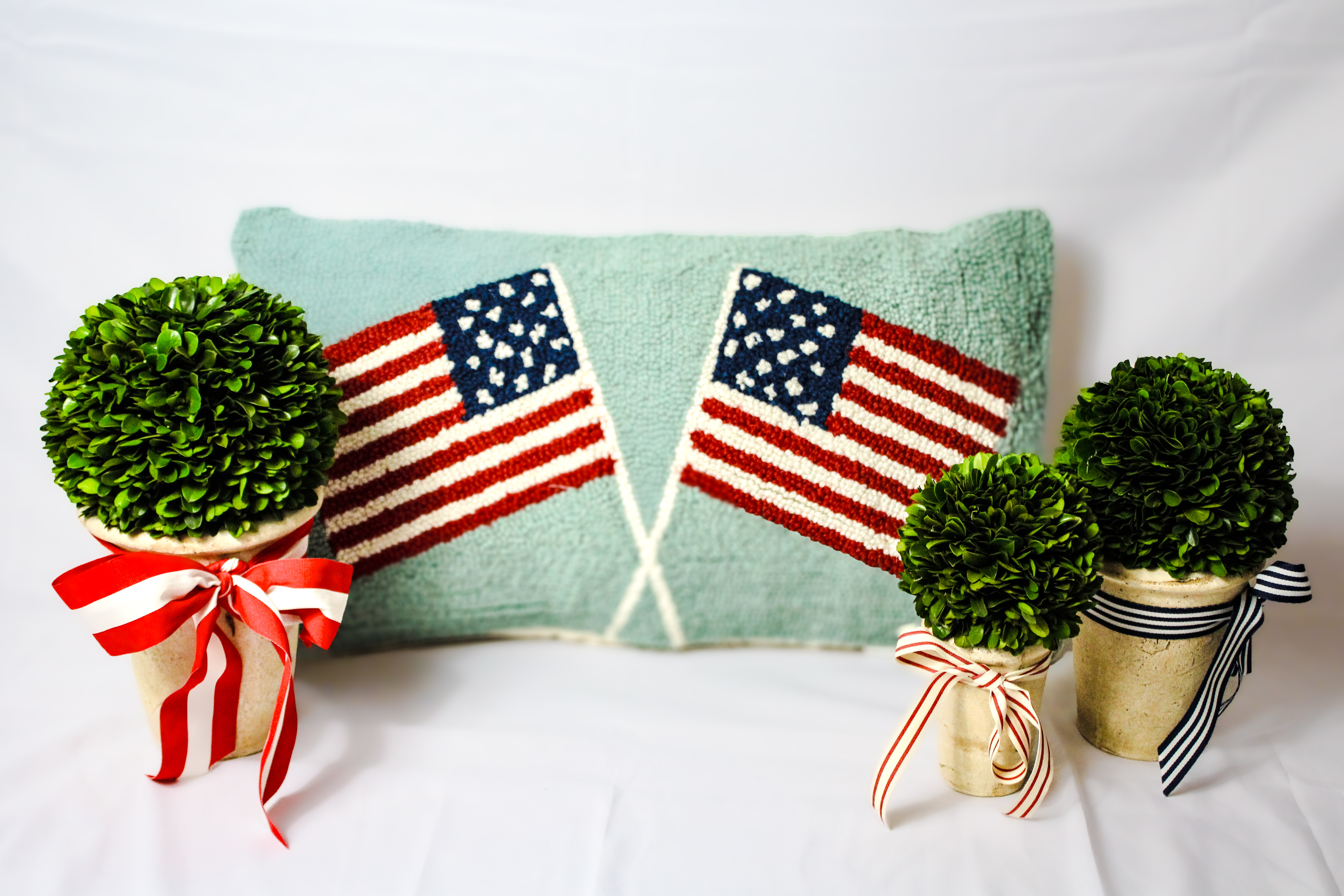 Wool Hooked Pillow and Topiaries curated by Beehive Home
